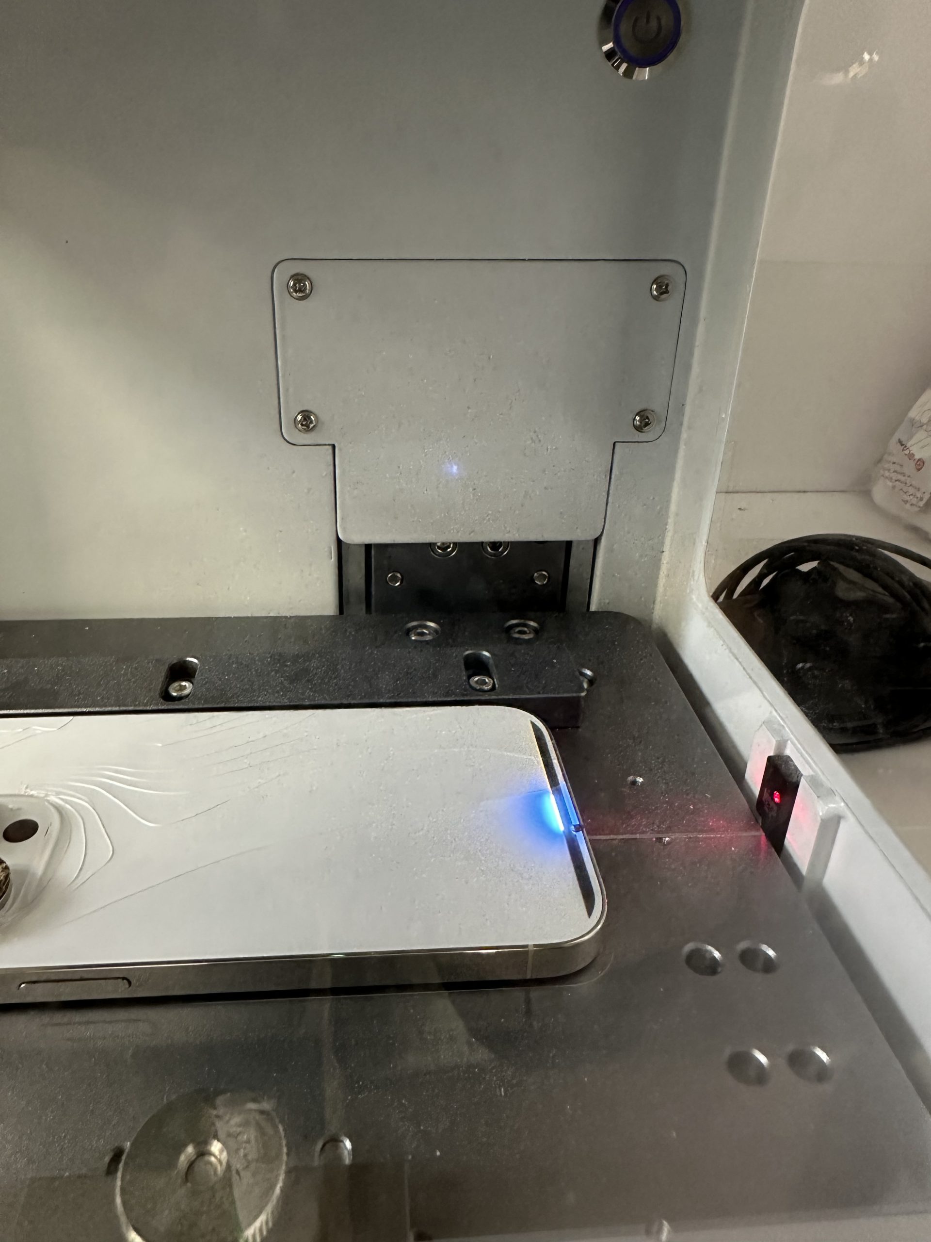 CO₂ laser softening adhesive under back glass